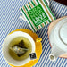 orange green love - Té verde Sencha con manzanilla y cascaras de naranja- 10 piramides - taza - lifestyle